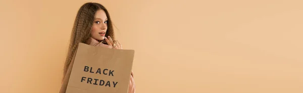 Smiling Teenage Girl Holding Paper Bags Black Friday Lettering Isolated — Stock Photo, Image