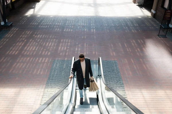 High Angle View Fashionable African American Man Shopping Bags Escalator — Stock Photo, Image