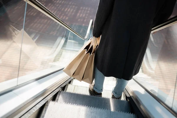 High Angle View Cropped Man Coat Holding Shopping Bags Escalator — Stock Photo, Image