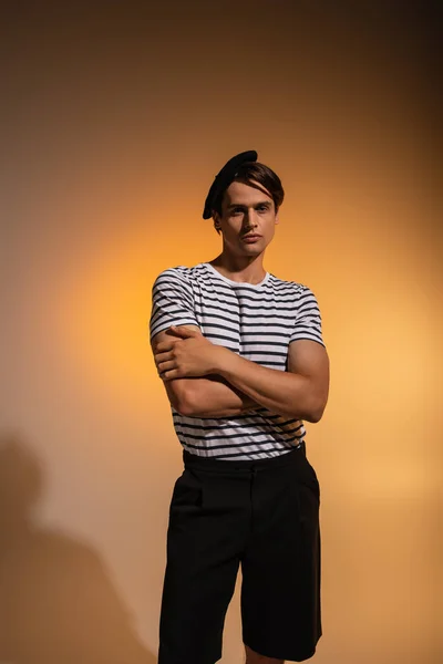 Stylish Man Beret Striped Shirt Looking Camera While Posing Crossed — Stock Photo, Image