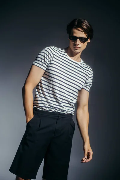 Model Sunglasses Shorts Posing Grey Background Lighting — Stock Photo, Image