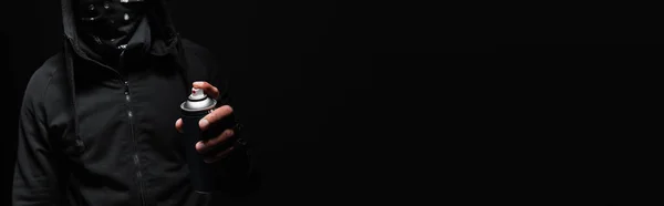 Cropped view of african american hooligan holding spray paint isolated on black, banner — Photo de stock