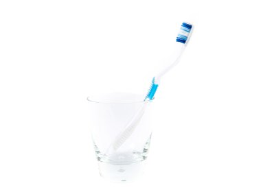 tandenborstel en glas
