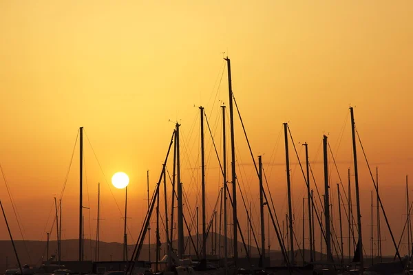 Sunset over the masts — Stock Photo, Image