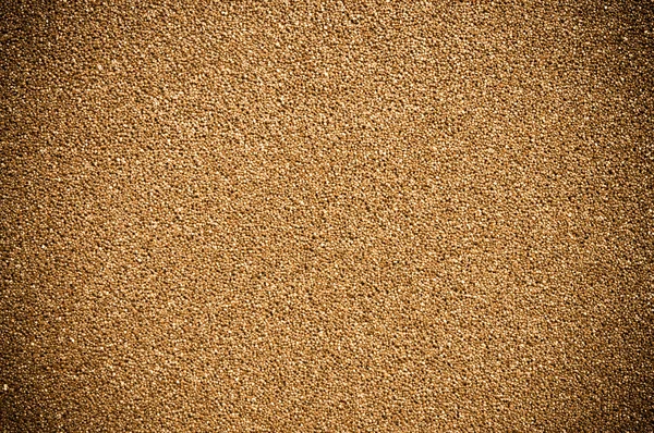 Золотой коричневый песок — стоковое фото