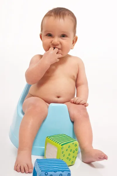 Baby boy sitting on potty — Stock Photo, Image