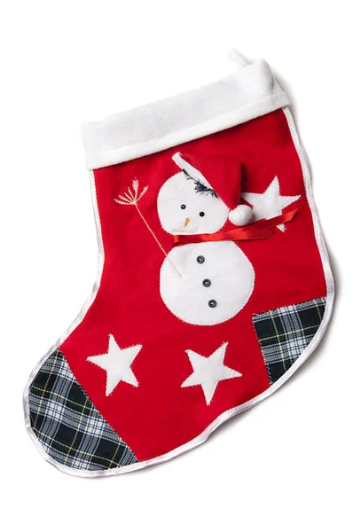 Sešívané sněhulák na červené vánoční ponožka. Royalty Free Stock Fotografie