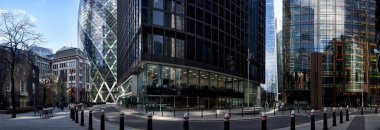 Panoramic photograph of modern glass architecture in city of Londons financial district