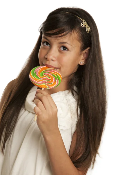 Девушка с конфетами — стоковое фото