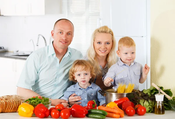 Happy family at kitchen. — Stock Photo, Image