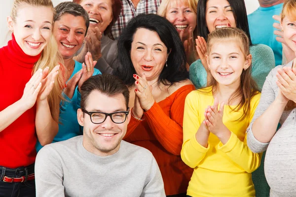 Happy people clap their hands. — Stock Photo, Image