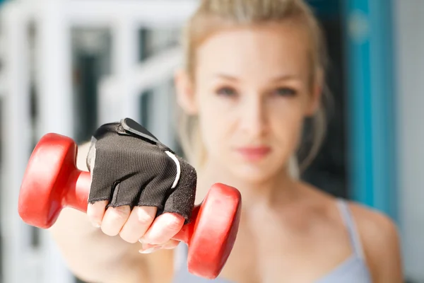 At the fitness club.Focus on dumbbells — Stock Photo, Image