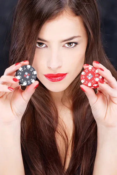 Woman holding chips for gambling — Stock Photo, Image