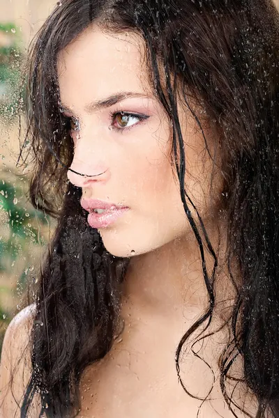 Beautiful wet girl in tropical environment — Stock Photo, Image