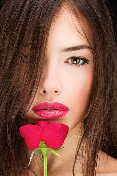 Woman and red rose — Stock Photo, Image