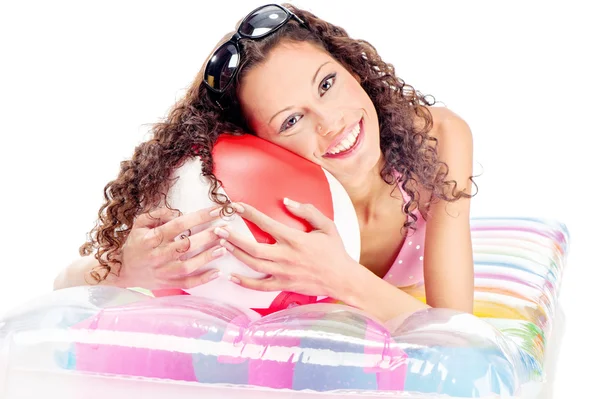 Girl on air mattress — Stock Photo, Image