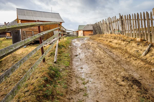 Dirty road in Carpathian village — Stock Photo, Image