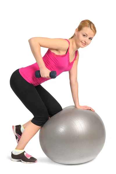 One-Arm Dumbbell Row on Stability Fitness Ball Exercise — Stock Photo, Image