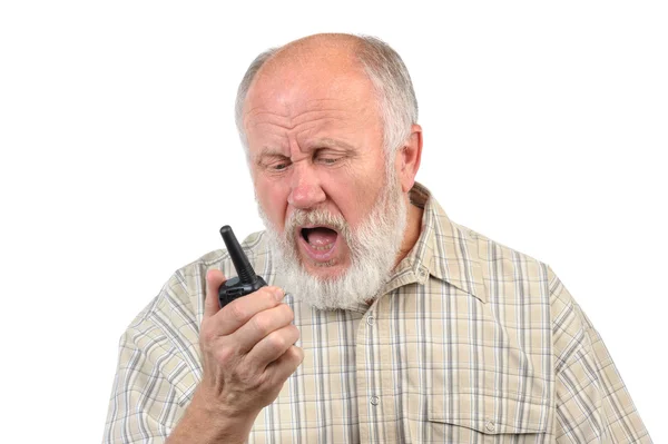 Telsiz telefon kullanarak konuşan üst düzey kel adam — Stok fotoğraf