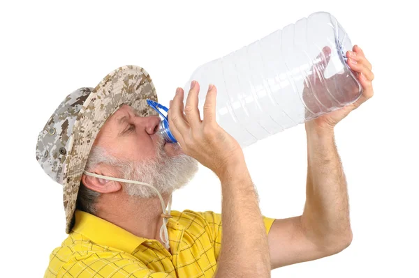 Senior man looking into empty bottle — Stock Photo, Image