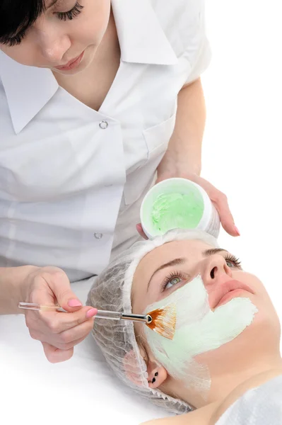 Beauty salon, facial mask applying — Stock Photo, Image