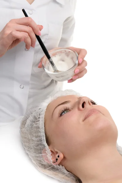 Beauty salon, facial mask applying — Stock Photo, Image