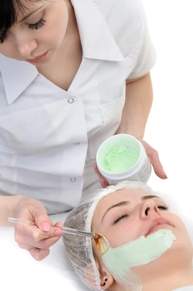 Beauty salon, facial mask applying — Stock Photo, Image