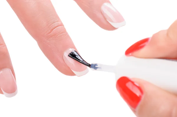 Manicure, applicando smalto trasparente — Foto Stock