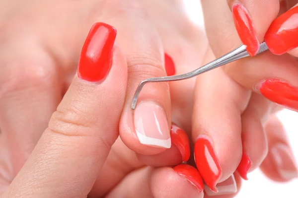 Manicure applying - cleaning the cuticles — Stock Photo, Image