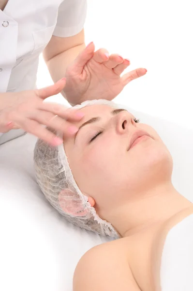 Gezicht massage met struikgewas masker — Stockfoto