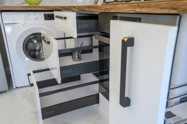 Closeup White Wooden Modern Kitchen Furniture Some Drawers Ejected High — Fotografia de Stock