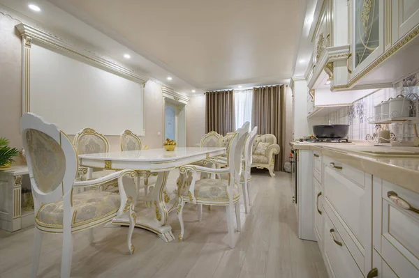 Interior renovation showcase of rich classic white kitchen