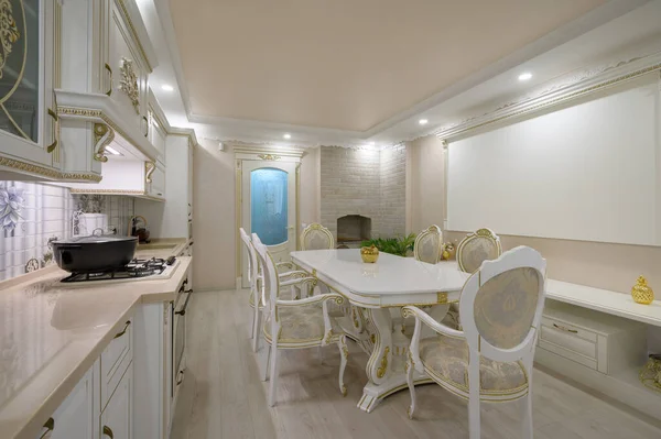 Interior renovation showcase of rich classic white kitchen