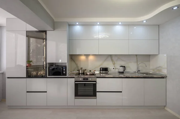 Interior Well Designed Modern Trendy White Kitchen Front View — 图库照片