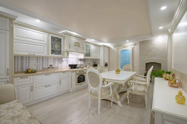 Interior renovation showcase of rich classic white kitchen