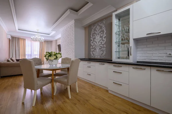 Luxury white and pink modern studio apartment interior with dining zone and living zone