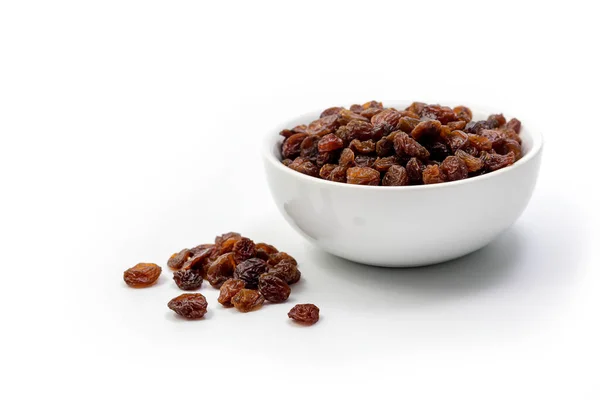 Brown Raisins White Bowl Isolated White Background — стоковое фото