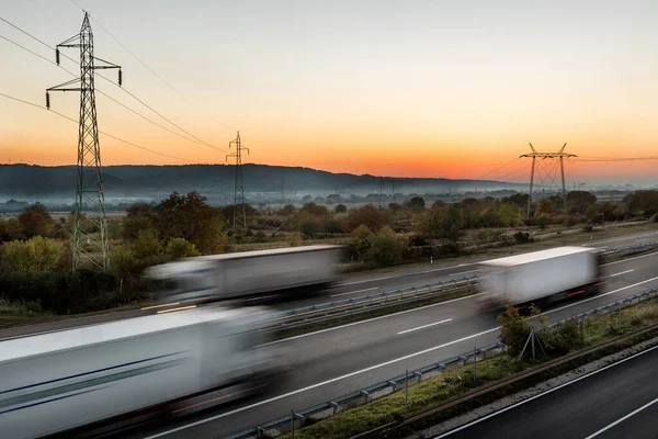 High Spped Blurred Highway Traffic Delivery Lorry Trucks Passing Both — Stock Fotó