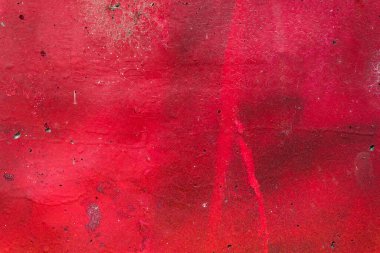 Kırmızı boyanmış beton duvar, çimento duvar, dizayn için çimento dokusu, soyut kırmızı doku. Kırmızıya boyanmış eski bir duvar. Grunge doku arkaplanı