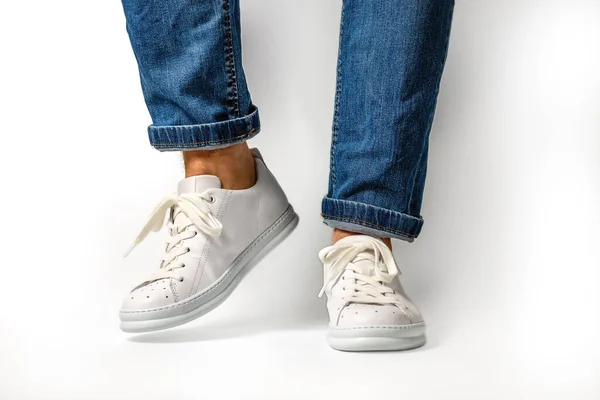 Man Stylis New White Sneakers Jeans White Background Horizontal Image — Fotografia de Stock