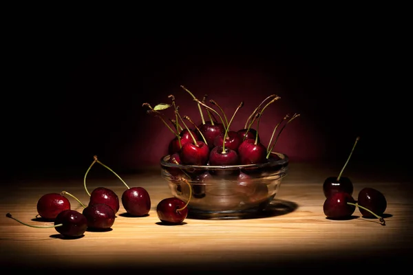 Glass Bowl Full Ripe Red Dark Sweet Cherries Wooden Table — Stock Photo, Image