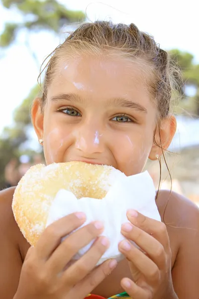 Girl with donut — Stock Photo, Image