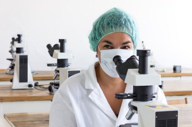 Woman in laboratory clipart