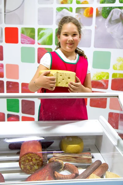 Girl shop assistant — Stock Photo, Image