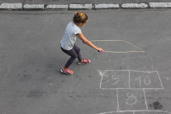 Girl with skipping rope — Stock Photo, Image