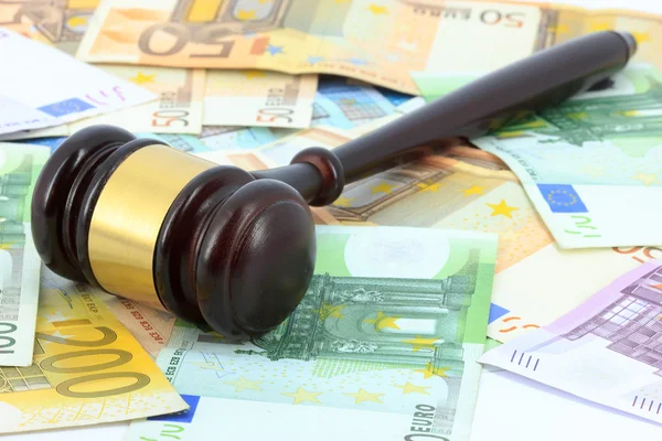 Wooden gavel and money — Stock Photo, Image