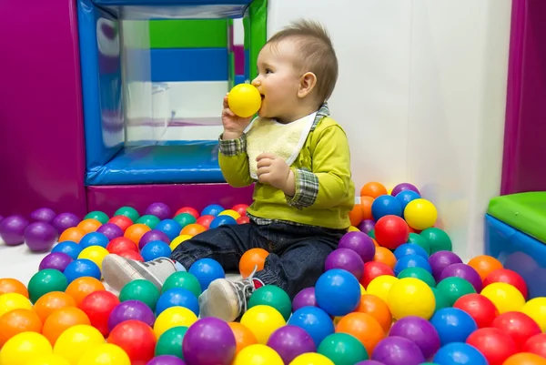 Little boy and balls — Stock Photo, Image