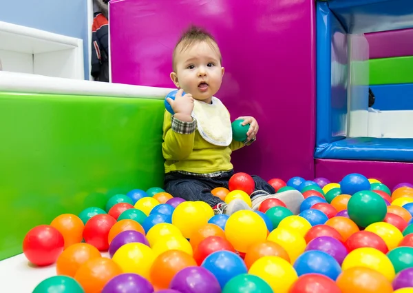 Menino e bolas — Fotografia de Stock