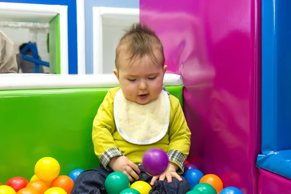 Little boy and balls — Stock Photo, Image