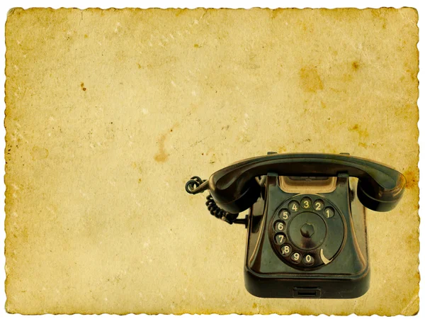 Old black phone on vintage background — Stock Photo, Image